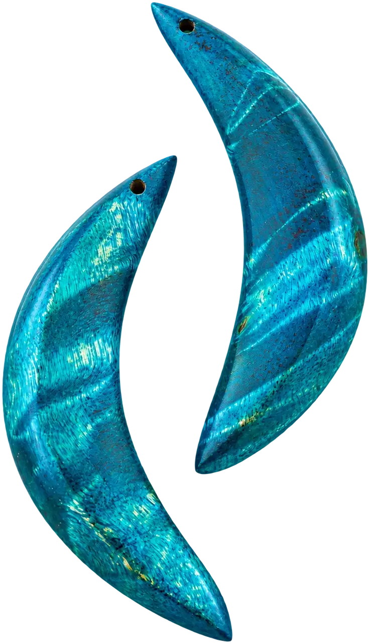 Lief · Teal Crescents. A pair of slim crescents in teal-dyed wood with a rippling figure. Each is drilled at the tip to hang.