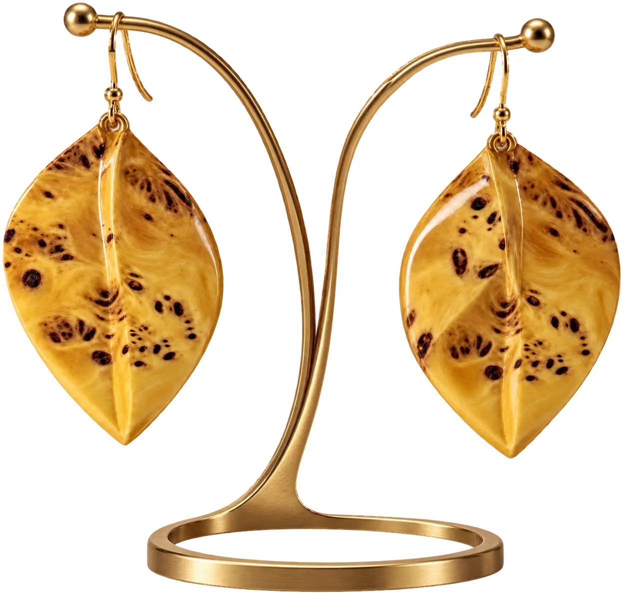 Elia. Leaves in golden burl with a carved central vein.